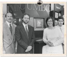 Jack Suess with faculty members Bill Shewbridge ’80, history,and Peggy Southerland ’75, theatre, and Ethan Berner ’02, visual arts.